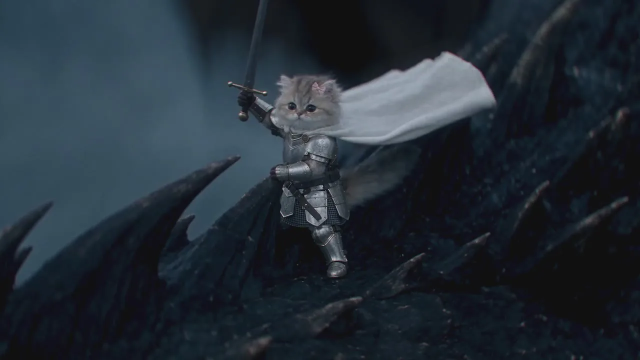 6.1 s — the reveal on the drop: a clay stand-in on the neck vs the kitten knight.